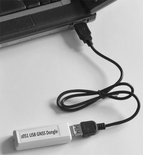 z051 USB GNSS dongle connected to a laptop with USB extension cable